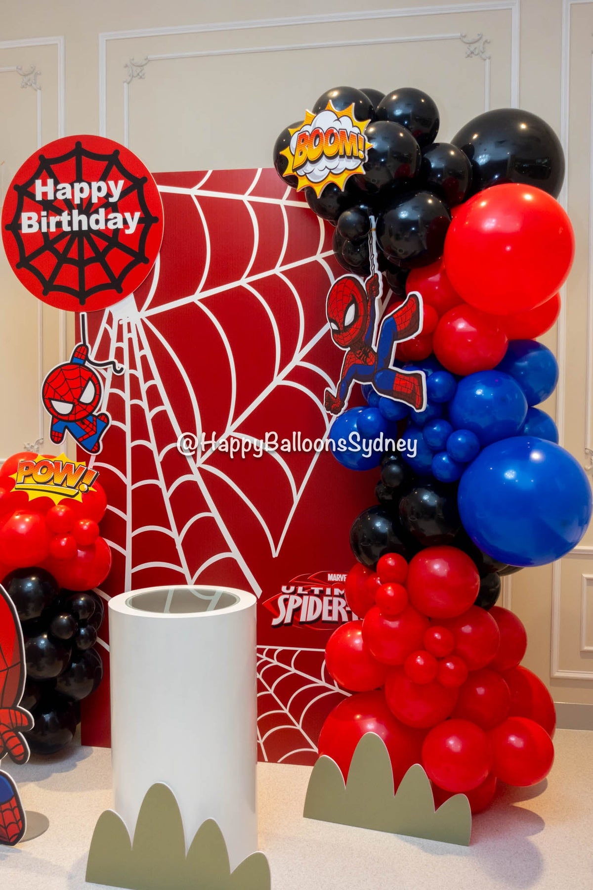 Baby Spider-Man balloon garland and party backdrop in red, blue and black