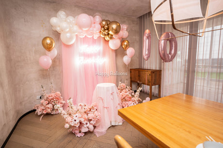 Pink and gold balloon garland, Happy Birthday sign and helium number 10 in a Chatswood private room
