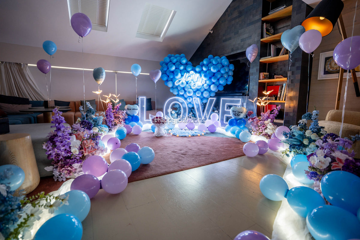 Completed Ovolo Sydney proposal room with LOVE letters, flowers and balloons