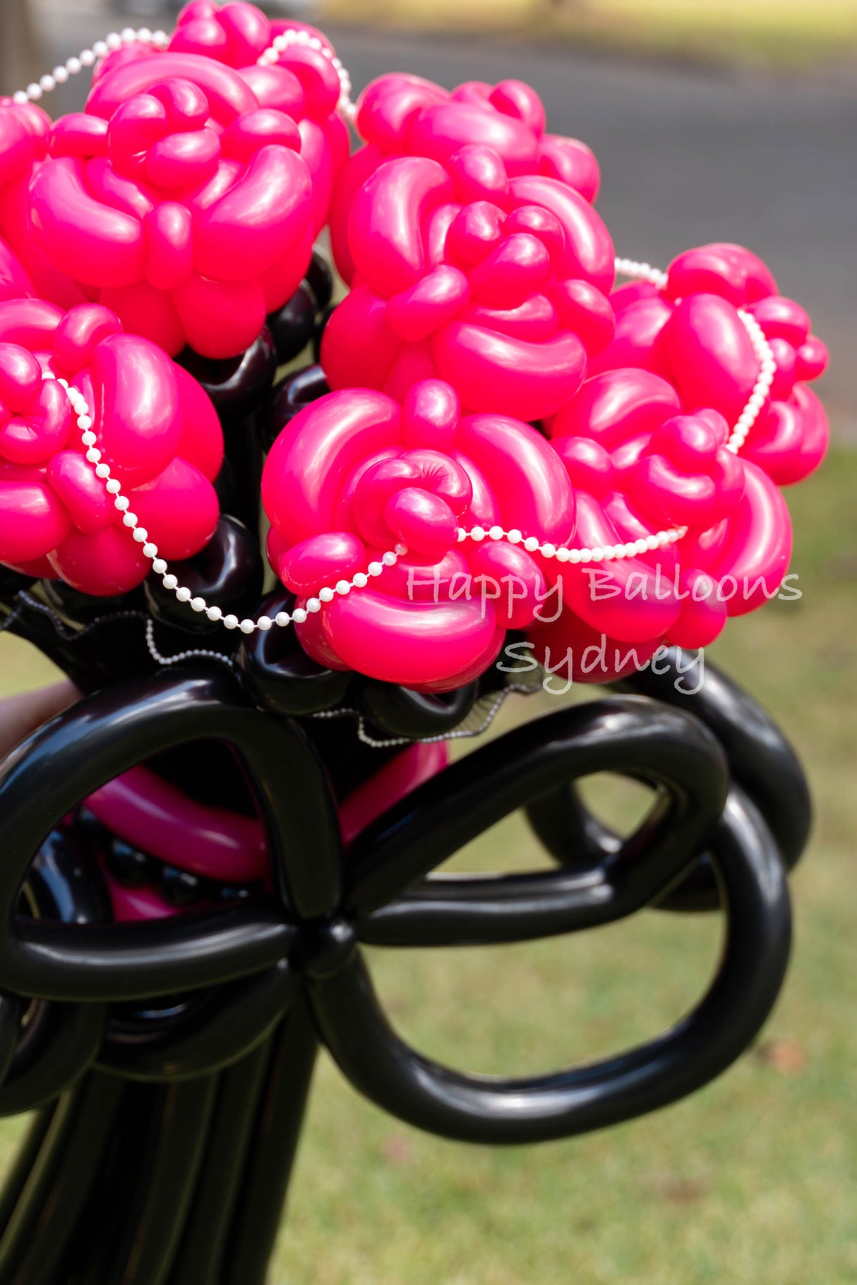 SKU-102047 Twisted Balloon Flowers Bouquet Roses