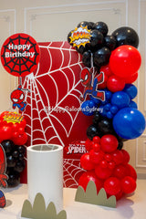 Baby Spider-Man balloon garland and party backdrop in red, blue and black