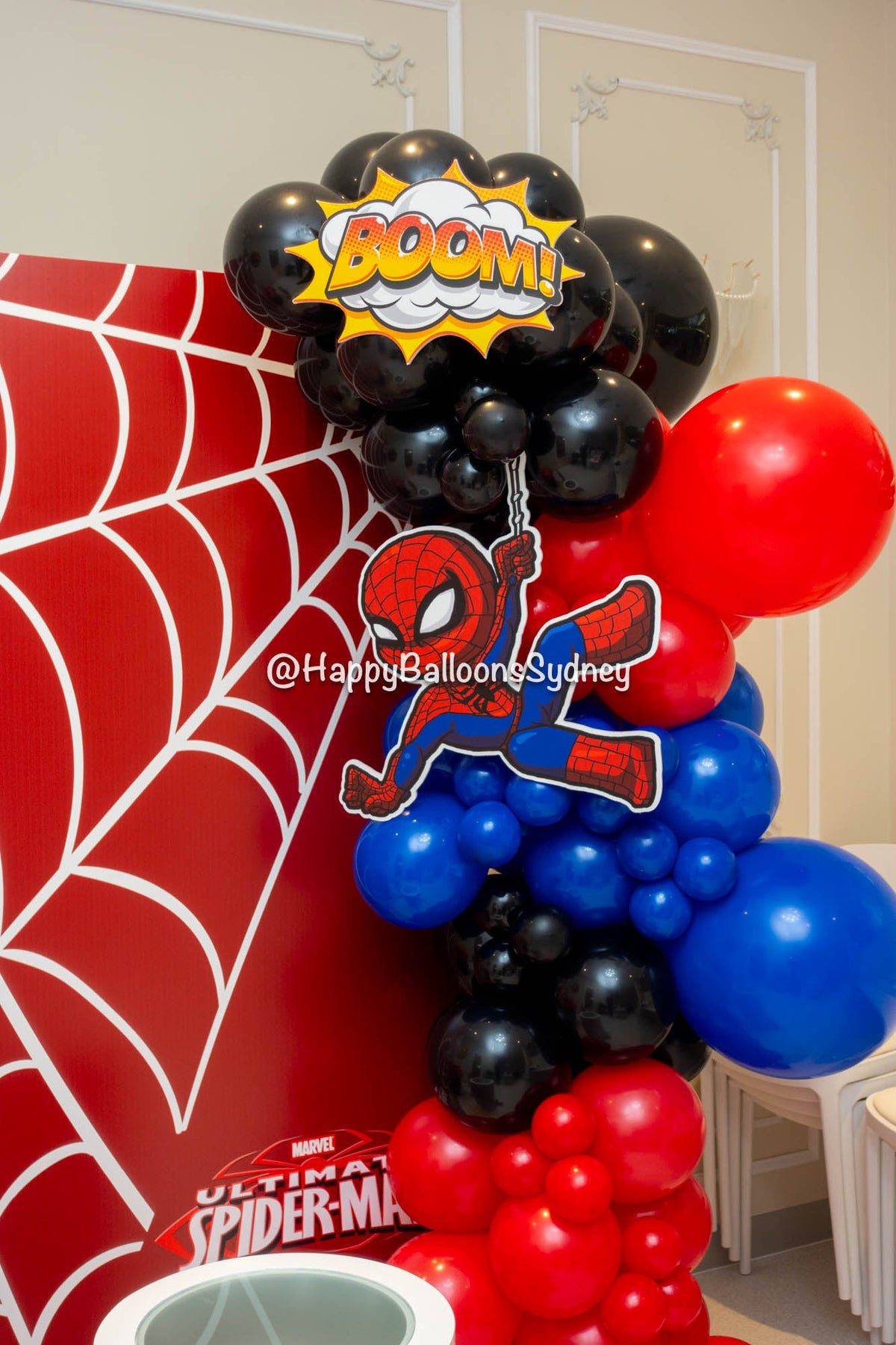 Baby Spider-Man birthday balloon setup close-up